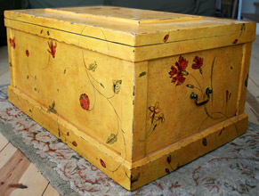 Antique hinged-top trunk